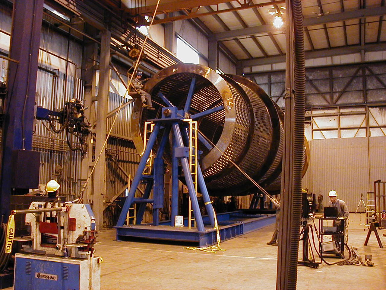 on-site machining of large drums in portable lathe.
