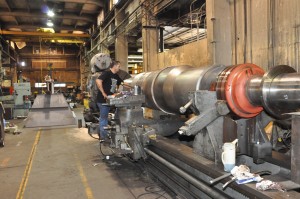 Industrial fan shaft machined in Prime Machine shop Prime Machine shop NIles lathe with expert craftsman machining large industrial fan shaft for power plant.