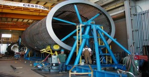 World class machining 22 feet diameter by 60 feet long weighing several hundred tons. Field machining or on site machining of large dryer shell flanges in portable large machining center. World class machining.